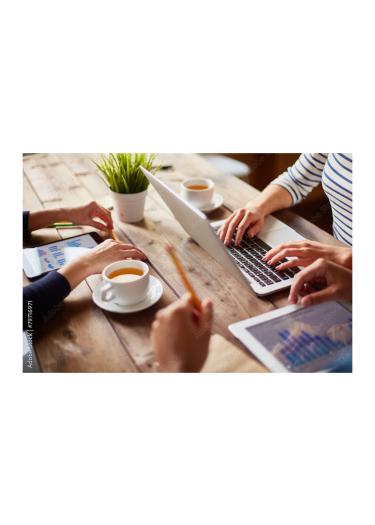 Group of people working on a desk